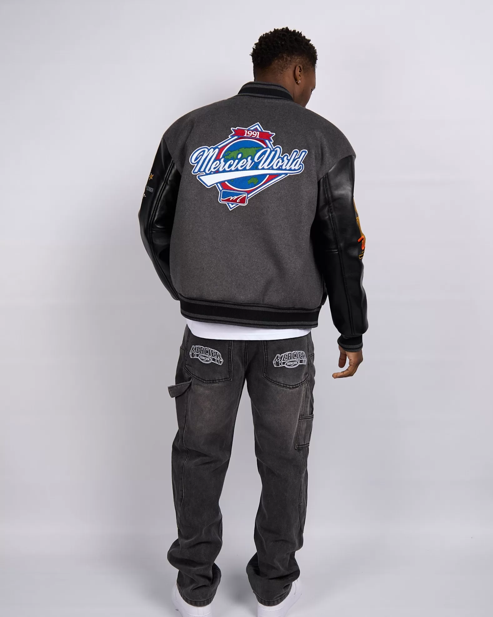 Shop Mercier Black Steel Rodman Varsity Jacket