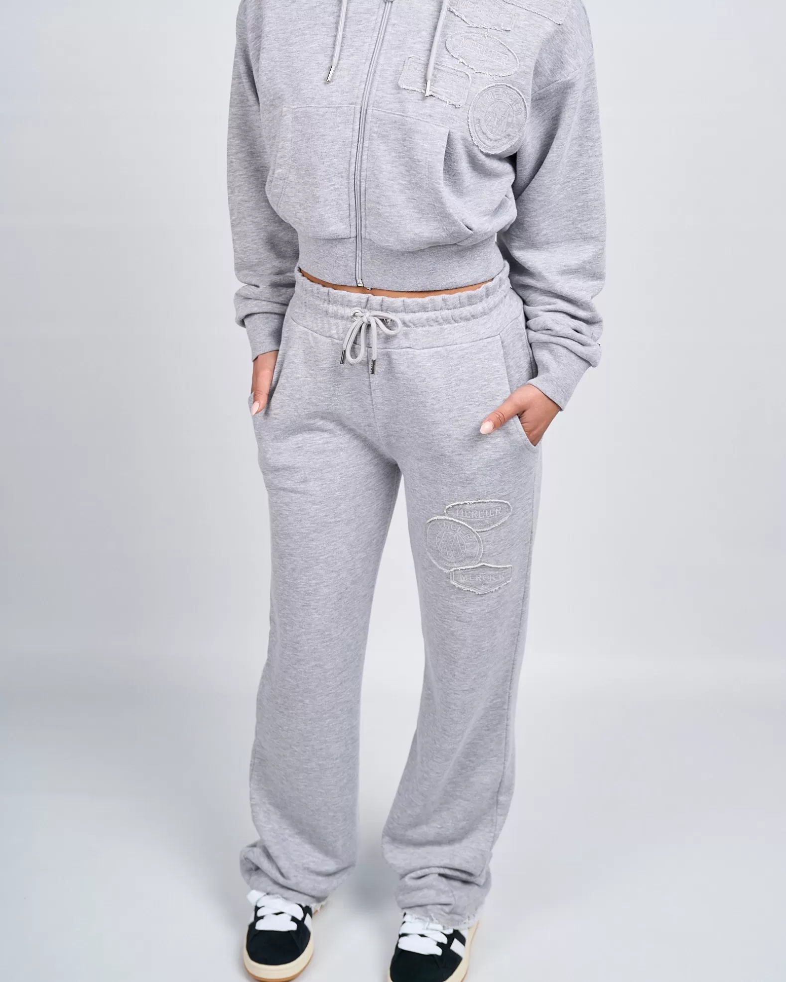 Shop Mercier Womens Grey Marl OG Badge Raw Joggers